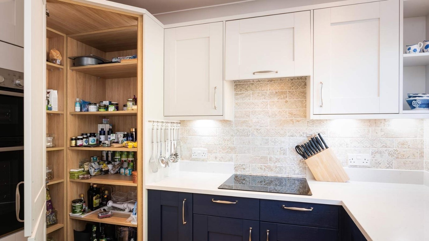 A small kitchen design with a corner pantry that maximises space